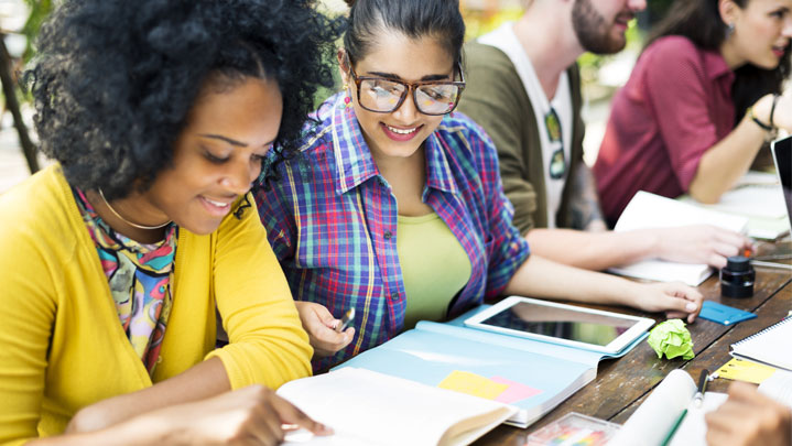 Students looking over educational materials