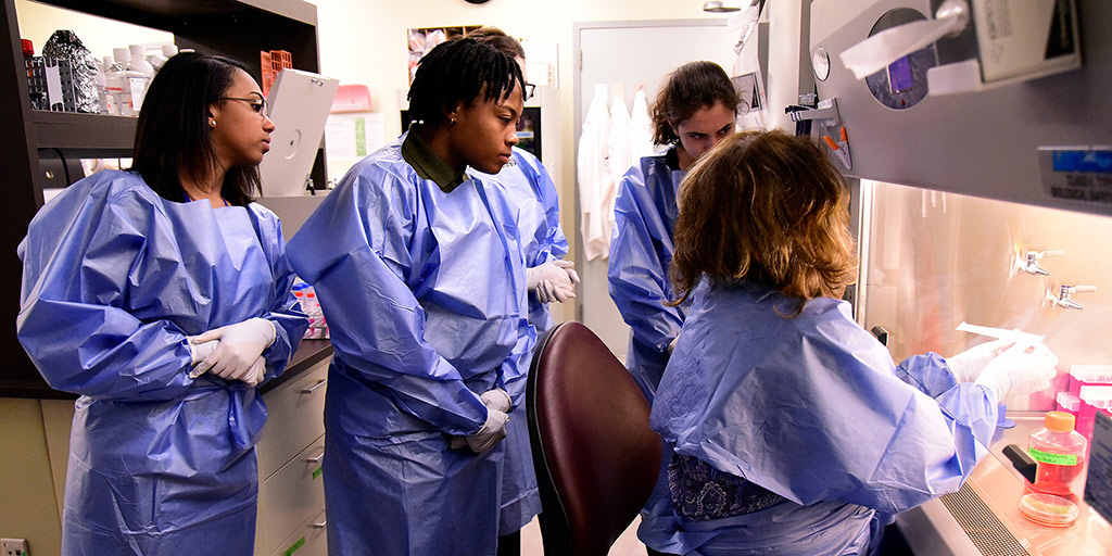 Students wearing protective gear in lab 