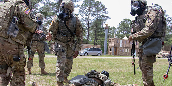 U.S. Army National Guard wearing gas masks