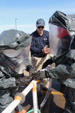 Worker training attendees in protective gear