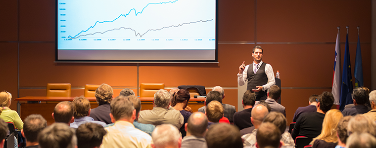 Man speaking in front of audience