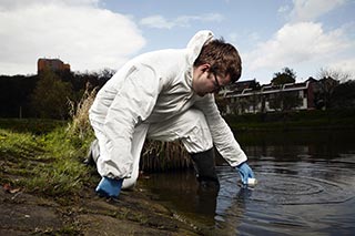 someone taking water samples