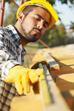 builder working on a house