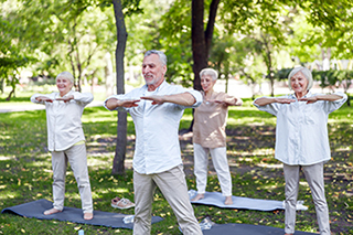 Elderly exercising outside