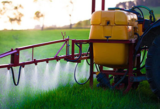 farm machinery spraying pesticides