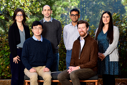 Standing from left to right: Eva Marques, Ph.D., Daniel S. Zilber, Ph.D., Ranadeep Daw, Ph.D., Mariana A. Kassien, Ph.D. Sitting down from left to right: Insang Song, Ph.D., Kyle P. Messier, Ph.D.