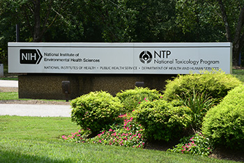 Front of NIEHS building with sign