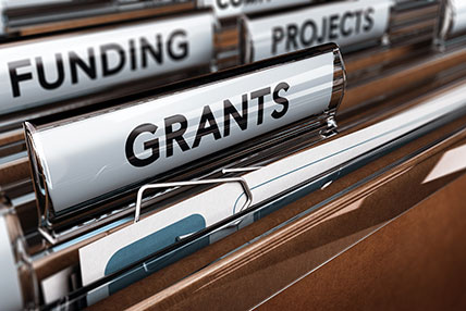 file folders with funding, project and grants tabs