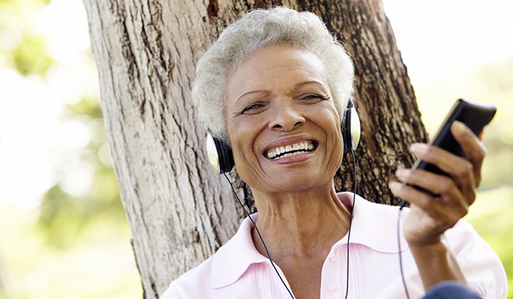 woman listening to MP3 player