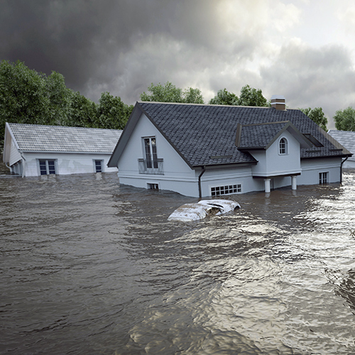 houses and car in flood waters
