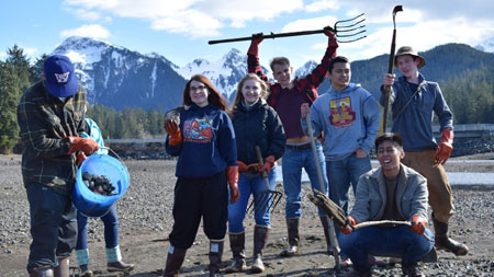 Pictures shows interns out collecting shellfish