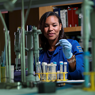 Nicole Sparks, Ph.D. working in a lab