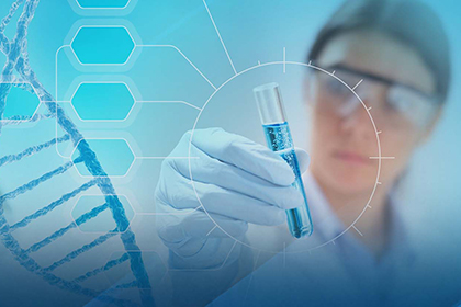 lady looking at a blue tube with DNA graphic in the foreground 