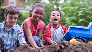 children playing in the dirt