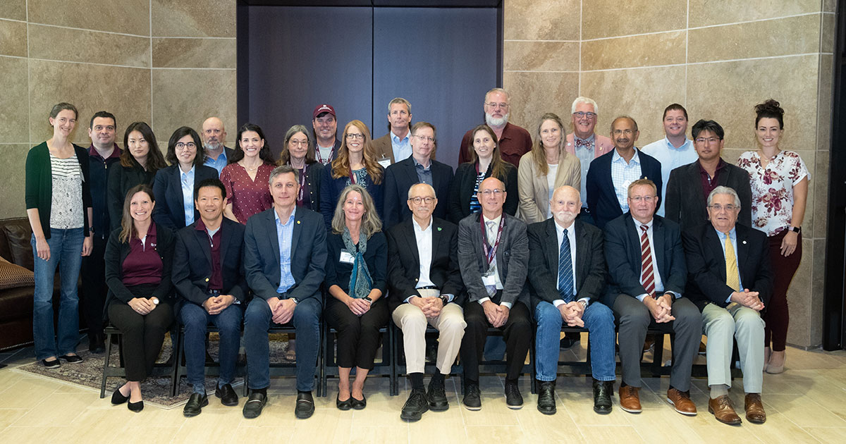 group photo of members of the Texas A&M University Superfund Research Center and NIEHS’ Michelle Heacock, Ph.D., and Director Woychik