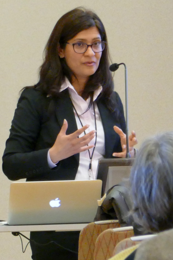 Mamta Behl, Ph.D. speaks at microphone