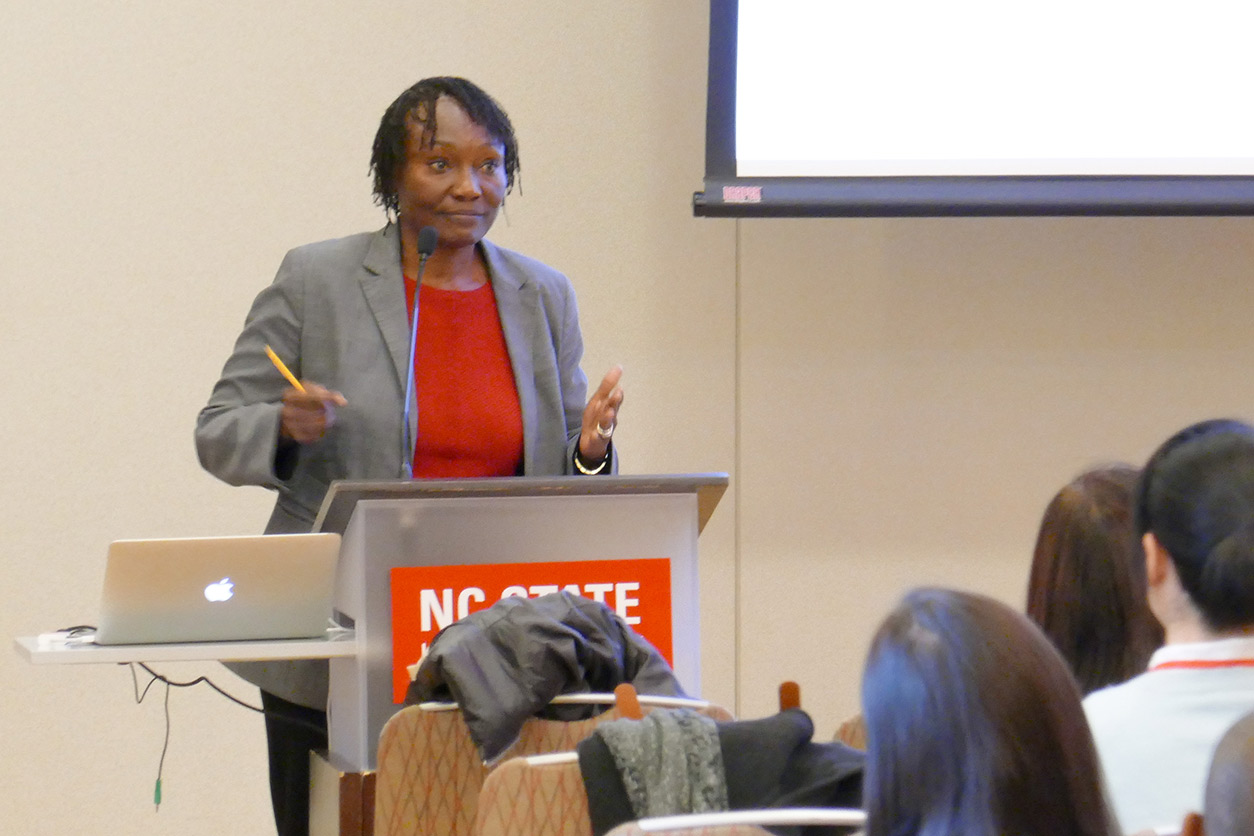 Cathrine Hoyo, Ph.D. speaks from podium