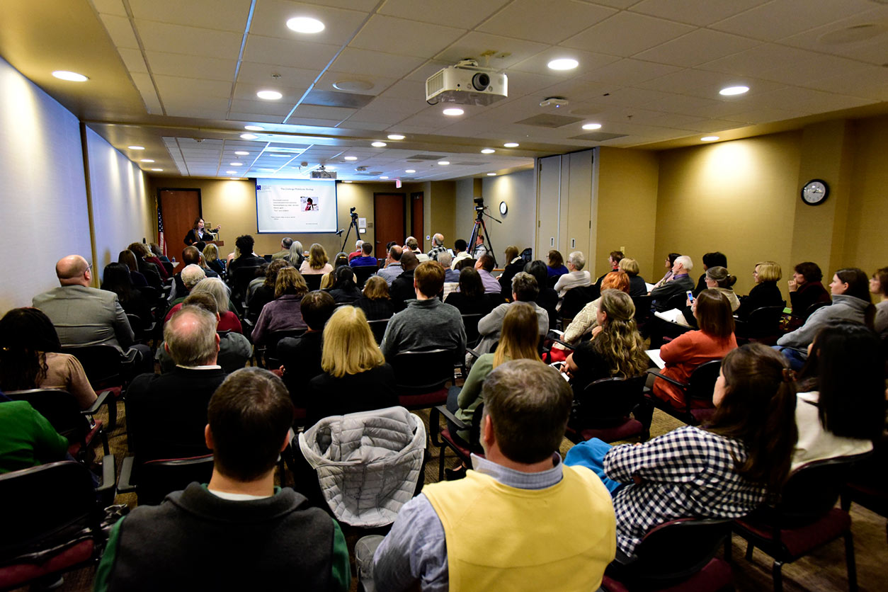 Frederica Perera, Ph.D. speaks to a large audience