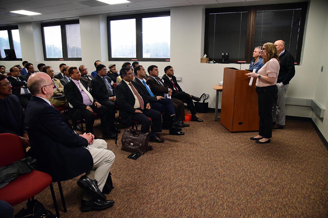 Bangladeshi audience with NIEHS speakers at podium