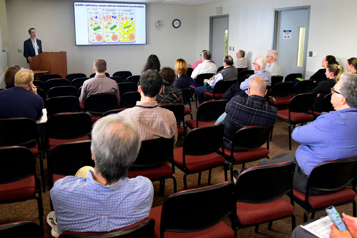 audience wactching Peter Tontonoz, M.D., Ph.D. at podium