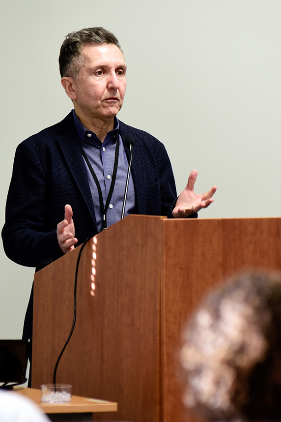 Serdar Bulun, M.D. at podium