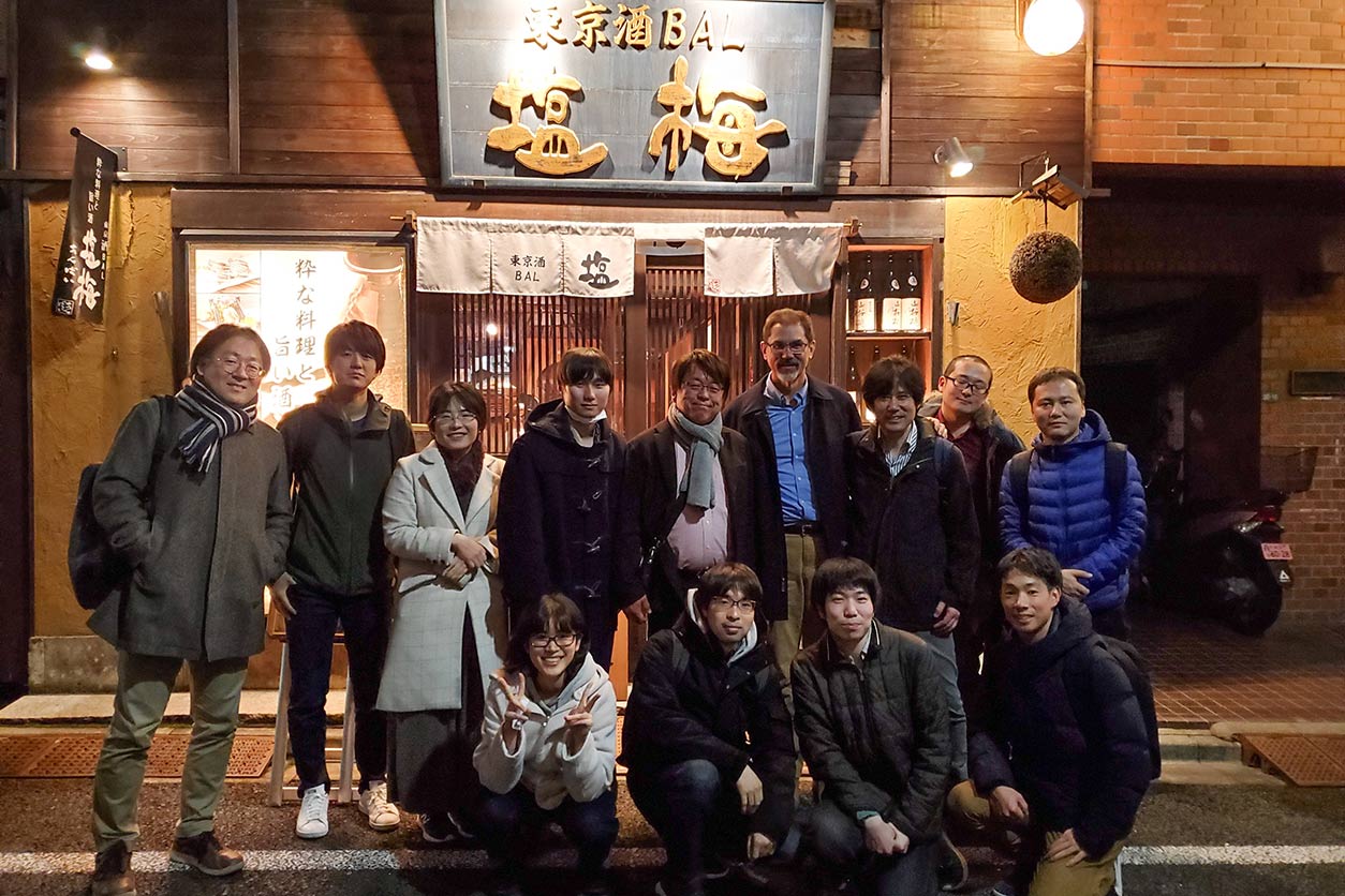 Paul Wade and Hitoshi Kurumizaka with the laboratory staff