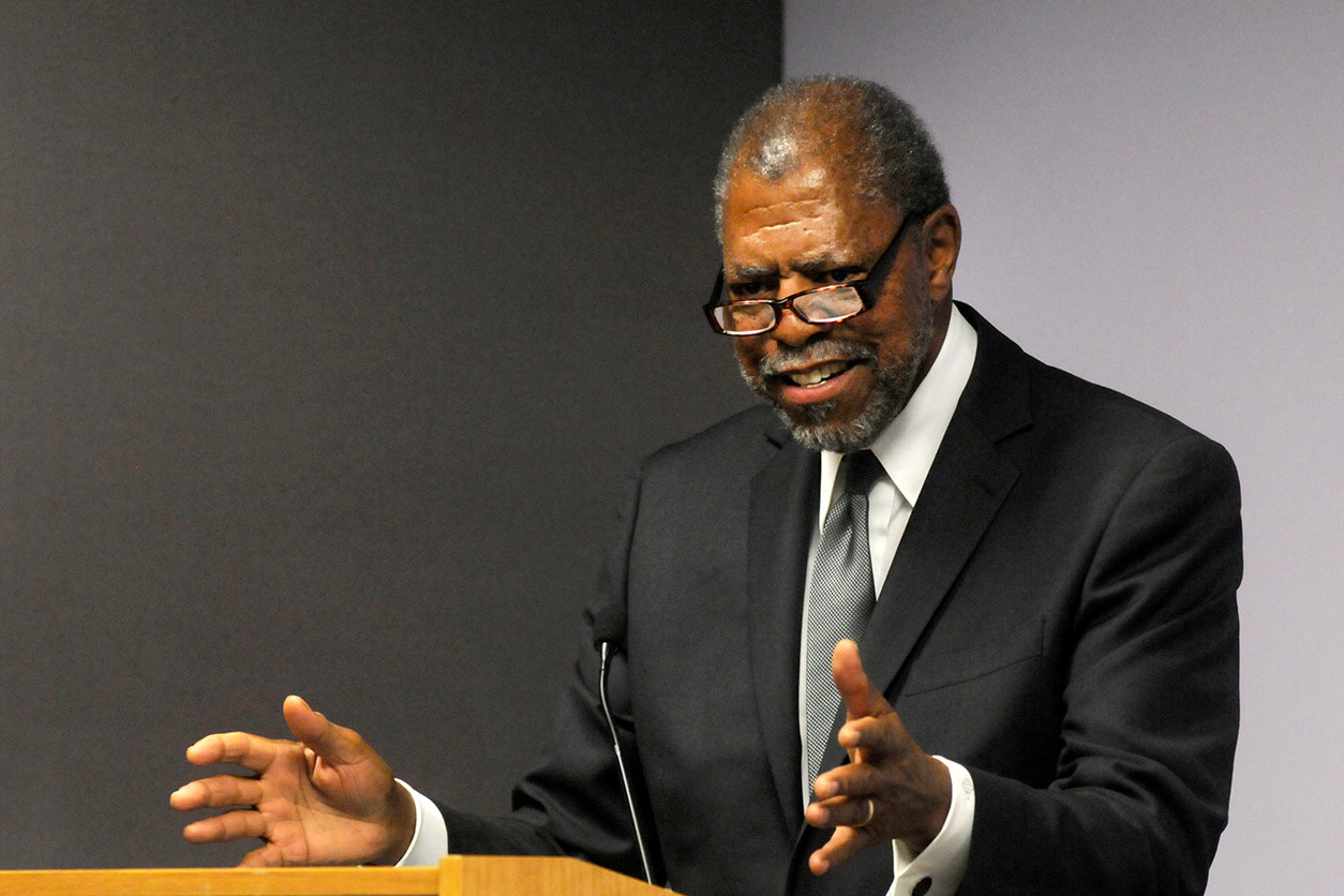 Kenneth Olden speaks at a podium
