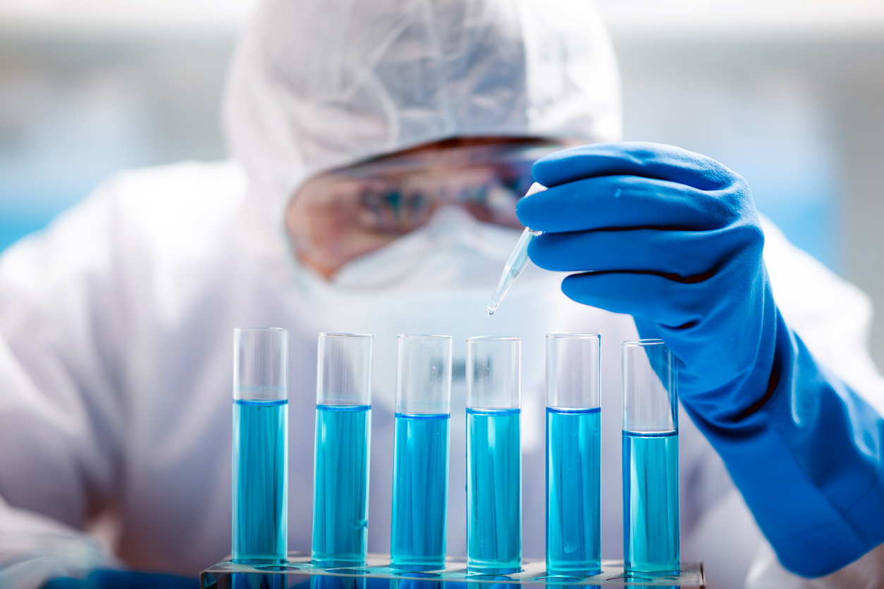 close up of man using a pipette
