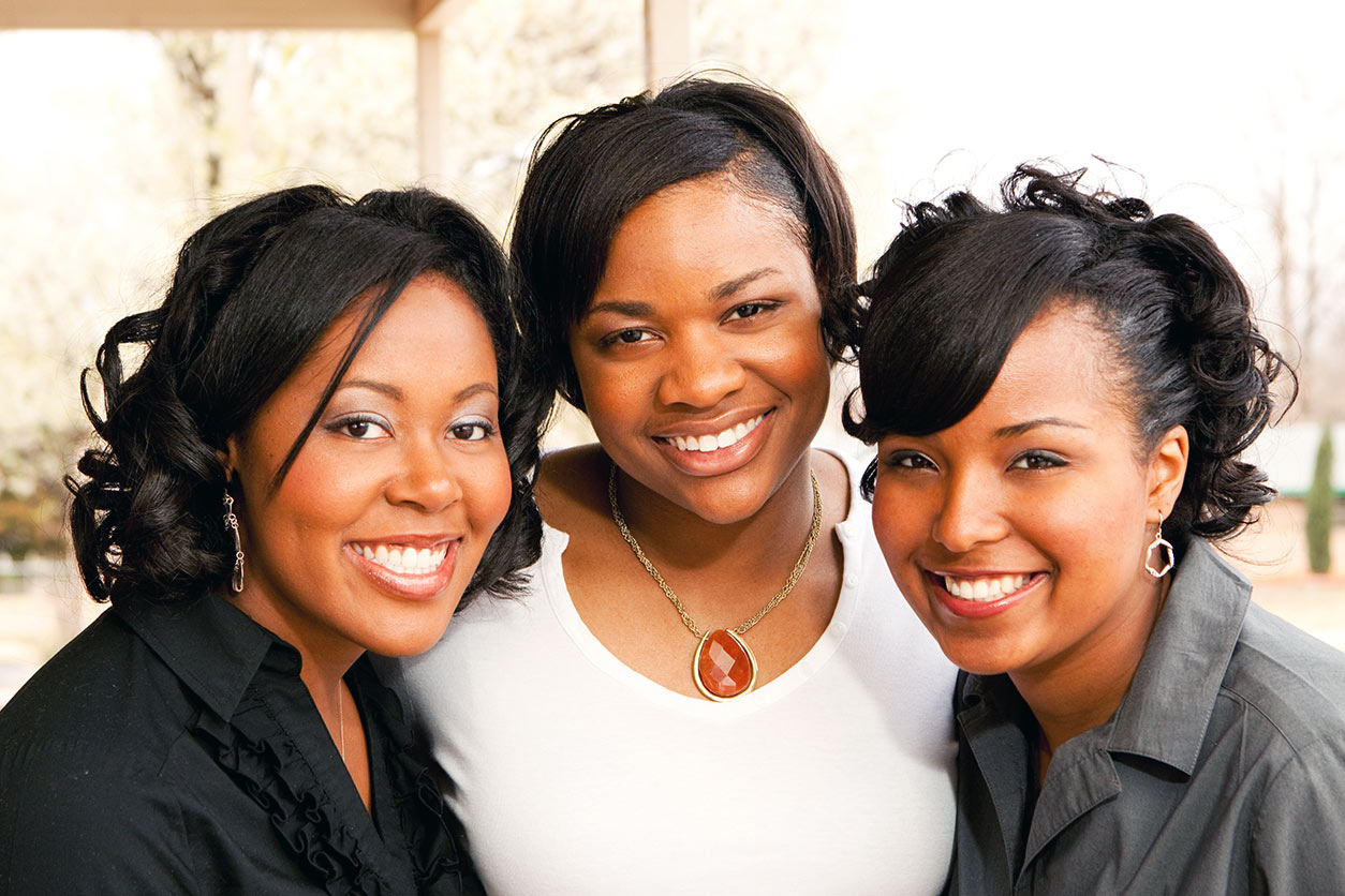 three women smiling