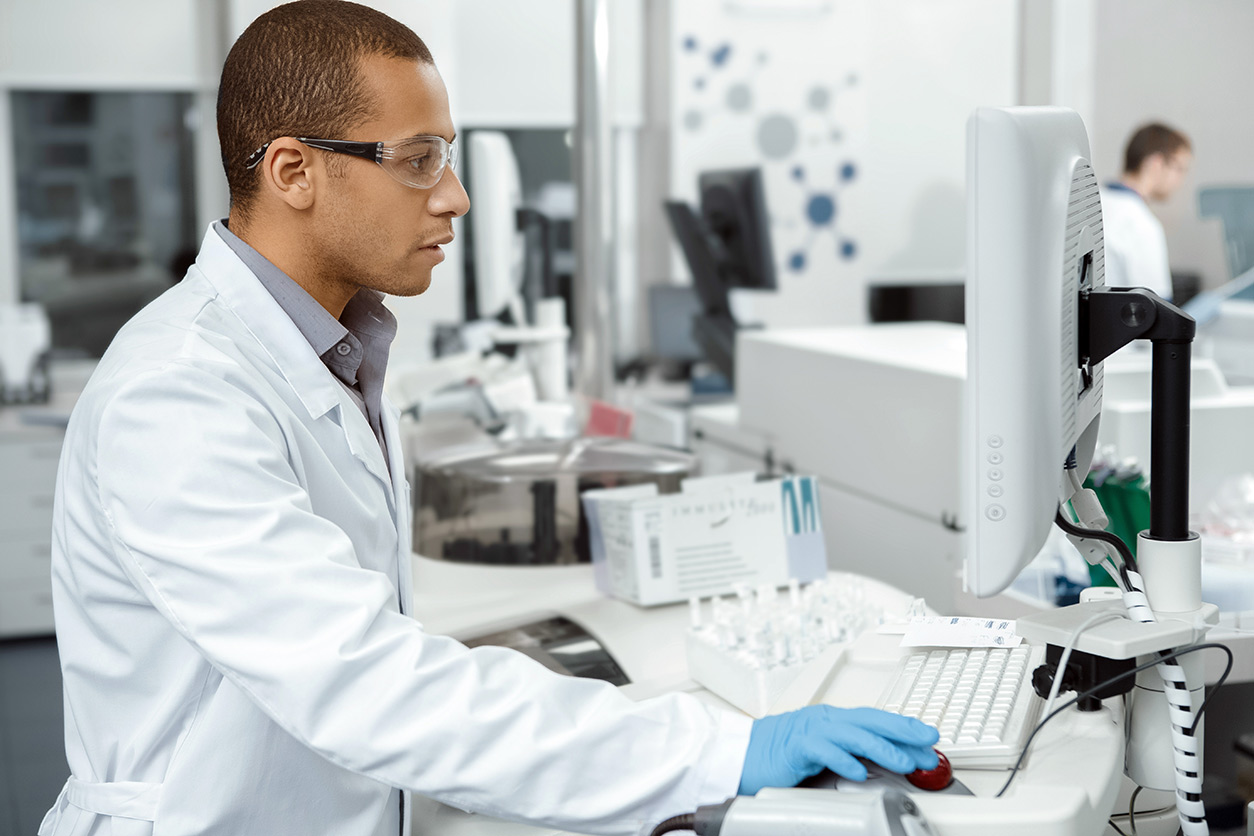 scientist using a computer in a lab