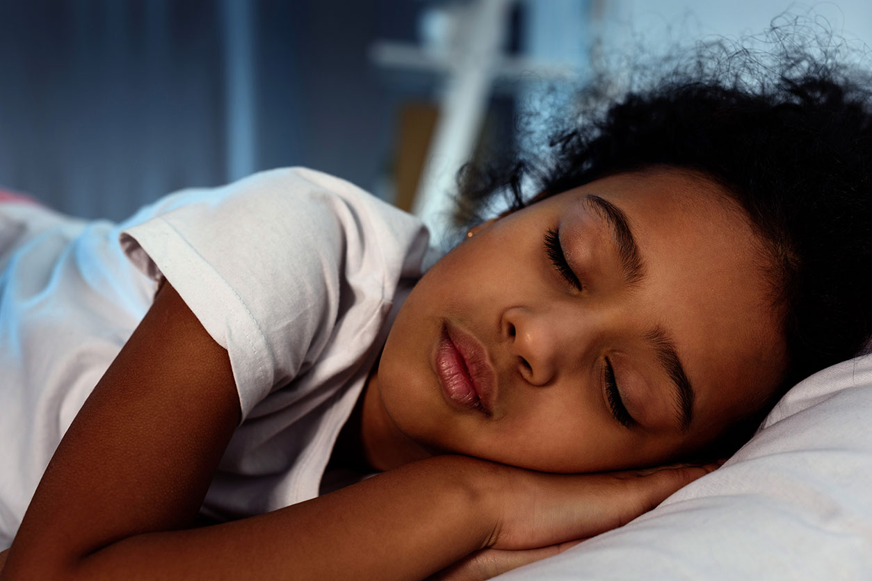 Little girl sleeping on her side