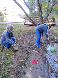 Angela and Sandra netting fish